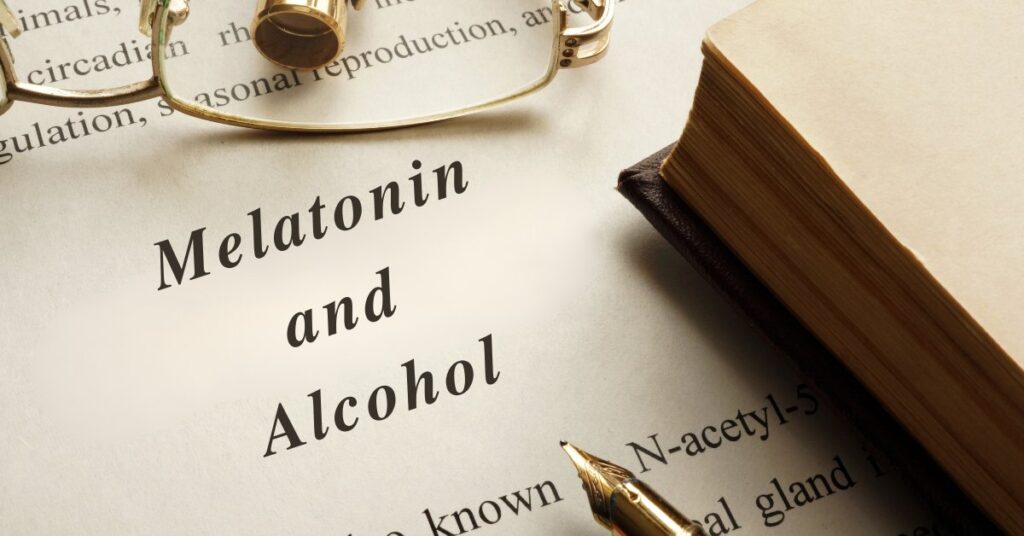 A book page with glasses and a pen, featuring the title "Melatonin and Alcohol," symbolizing their connection.